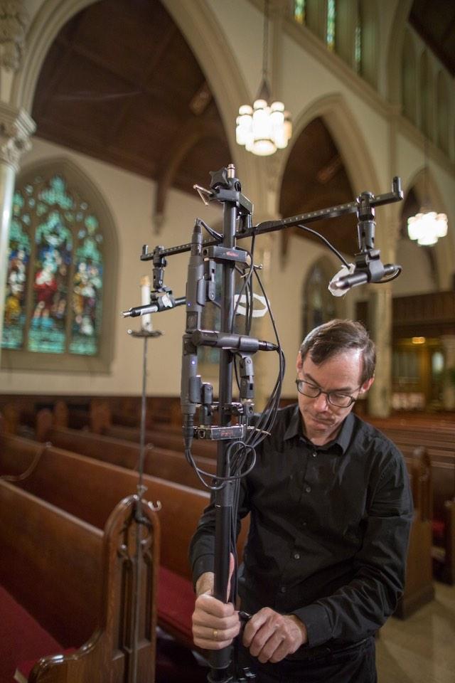 David setting up microphones